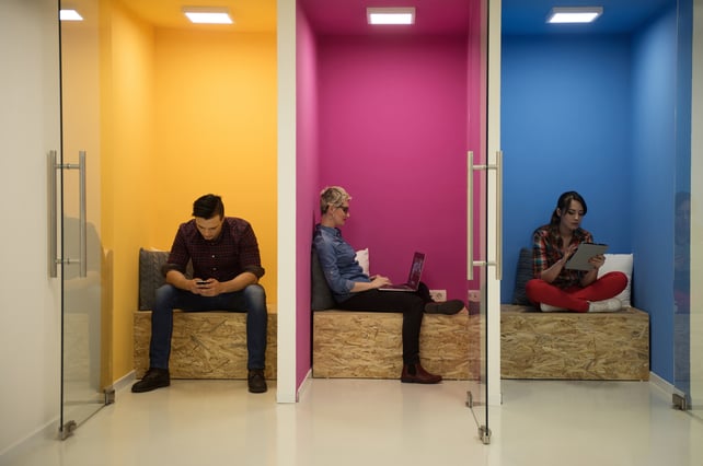 group of young business people having fun, relaxing and working in creative room space at modern startup office