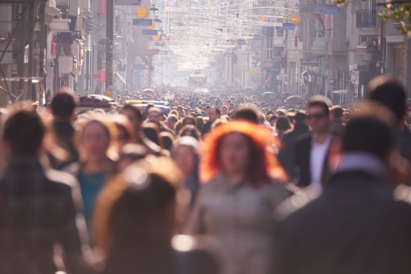 people crowd walking on busy street on daytime-1